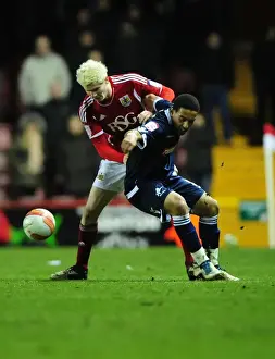 Bristol City V Millwall Prints: Bristol City vs Millwall: Ryan McGivern vs Liam Trotter Battle in Championship Match