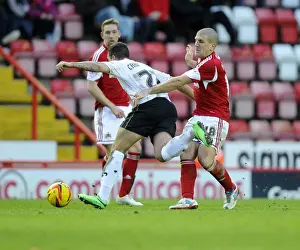 Bristol City vs MK Dons: Adam El-Abd Tackles Samir Carruthers in Sky Bet League One Clash