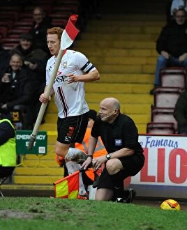 Images Dated 18th January 2014: Bristol City vs MK Dons: Dramatic Moment as Dean Lewington Slides Out Style Linesman at Ashton Gate