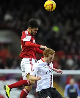 Bristol City vs MK Dons: Marlon Pack vs Dean Lewington in Aerial Battle at Ashton Gate
