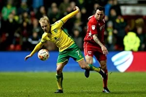 Images Dated 7th March 2017: Bristol City vs. Norwich City: Lee Tomlin Challenges Steven Naismith