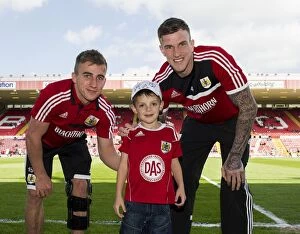 Images Dated 18th April 2014: Bristol City vs Notts County: Six-Year-Old Oliver Mumby Dons Cap at Ashton Gate (Sky Bet League One)