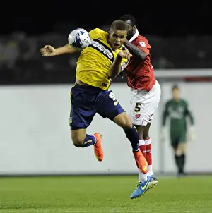 Capital One Prints: Bristol City vs Oxford United: Carlton Morris Outmuscles Derrick Williams for the Ball