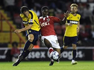 Images Dated 12th August 2014: Bristol City vs Oxford United: Jordan Wynter Battles for the Ball