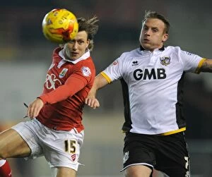 Images Dated 10th February 2015: Bristol City vs Port Vale: Intense Battle for the Ball between Luke Freeman and Chris Birchall