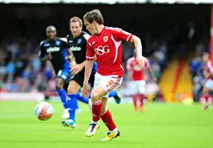 Bristol City vs Portsmouth, Championship Match: Neil Kilkenny in Action at Ashton Gate Stadium (2008-2011)