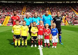 Images Dated 20th August 2011: Bristol City vs Portsmouth: A Football Showdown - Season 11-12