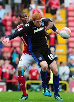 Bristol City V Portsmouth Prints: Bristol City vs. Portsmouth: Intense Battle Between Marvin Elliott and Dave Kitson in the 2008-09 Championship Match