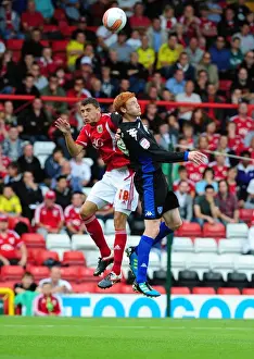 Bristol City V Portsmouth Prints: Bristol City vs Portsmouth: James Wilson vs David Norris - Championship Clash at Ashton Gate