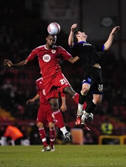 Bristol City v Portsmouth Collection: Bristol City vs Portsmouth: Kalifa Cisse vs Joel Ward - Championship Battle for the High Ball