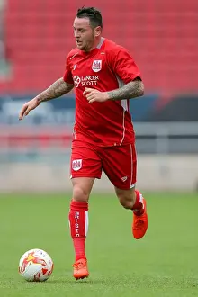 Bristol City V Portsmouth Prints: Bristol City vs Portsmouth: Lee Tomlin in Action at Ashton Gate Stadium (Pre-Season Friendly)