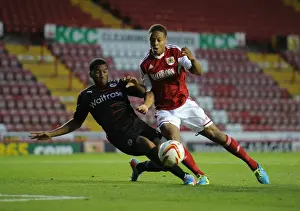 Bristol City V Reading Prints: Bristol City vs Reading: Intense Moment as Mariappa Tackles Reid in Penalty Box