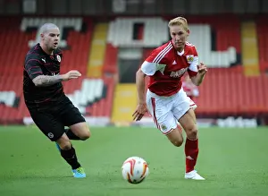 Bristol City V Reading Prints: Bristol City vs Reading: Intense Moment between Wagstaff and Guthrie