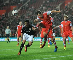 Southampton V Bristol City Prints: Bristol City vs Southampton: Intense Header Battle Between Derrick Williams and Jack Cork