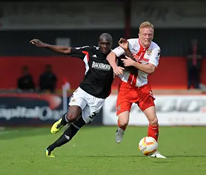Stevenage V Bristol City Prints: Bristol City vs Stevenage: Nyron Nosworthy vs Jordan Burrow - Intense Battle for Possession