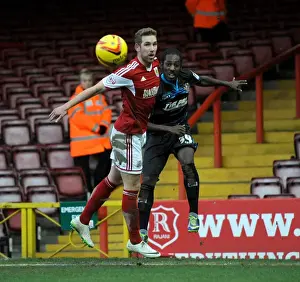 Bristol City vs Stevenage: Roarie Deacon Clears Under Pressure from Scott Wagstaff