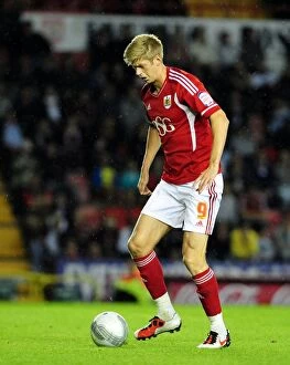 Images Dated 24th August 2011: Bristol City vs Swindon Town: Jon Stead Scores in League Cup Clash at Ashton Gate Stadium
