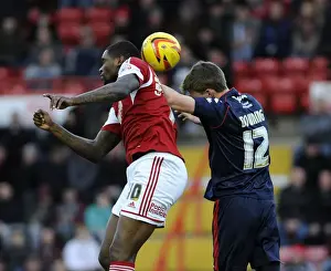 Bristol City V Walsall Prints: Bristol City vs Walsall: Intense Aerial Battle Between Jay Emmanuel-Thomas and Paul Downing