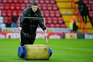 Framed Print : Bristol City vs. Watford: Defying Winter - The Groundsman's Battle