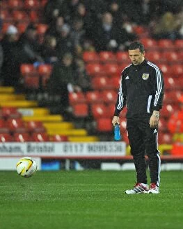 Images Dated 26th December 2012: Bristol City vs. Watford: Derek McInnes Examines the Pitch Before Referees Call Off Championship
