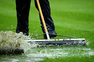 Framed Print : Bristol City vs. Watford: Groundsman Battles Winter Conditions Ahead of Championship Match