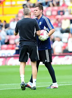Season 11-12 Prints: Bristol City vs. West Brom: Foster and Kenny Reunited on the Pitch (Championship)