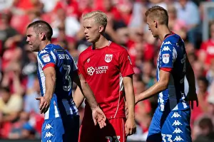 Opening Game Prints: Bristol City vs Wigan Athletic: Hordur Magnusson's Intense Focus at Ashton Gate Stadium