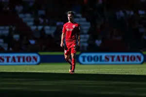 Opening Game Prints: Bristol City vs Wigan Athletic: Joe Bryan's Intense Stare at Ashton Gate Stadium