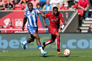 Opening Game Prints: Bristol City vs Wigan Athletic: Kodjia vs Daniels - Intense Battle at Ashton Gate