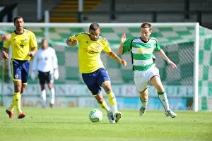 Images Dated 23rd July 2011: Bristol City vs Yeovil Town: Liam Fontaine vs Steve McClean - Pre-Season Friendly at Huish Park