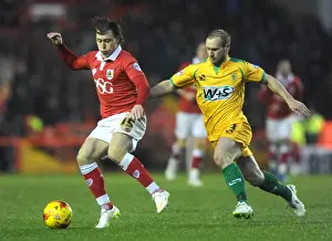 Bristol City V Yeovil Town Prints: Bristol City vs Yeovil Town: Luke Freeman vs Simon Gillett - Intense Moment in Sky Bet League One Clash