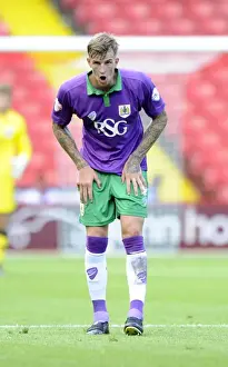 12 15 Prints: Bristol City's Aden Flint in Action at Sheffield United's Bramal Lane (09.08.2014)