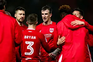 Bristol City's Aden Flint Celebrates 4-0 Win Over Huddersfield Town