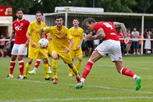 Bristol City's Aden Flint Heads a Shot in Preseason Community Match, 2015