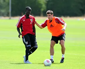 Bristol Citys Albert Adomah challenges for the ball with Bristol Citys Joe Edwards