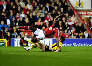 Bristol City V Watford Prints: Bristol City's Albert Adomah Foul by Jordan Mutch in Championship Match vs