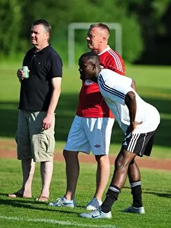 Images Dated 15th July 2010: Bristol Citys Albert Adomah talks with fans while warming up