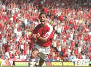 Bristol City's Alex Russell Celebrates Promotion to Championship