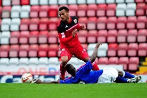 Images Dated 24th September 2012: Bristol City's Amadi-Holloway Outsmarts Ipswich's Kourouma