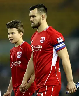 Leeds United V Bristol City Prints: Bristol City's Bailey Wright and Mascot Prepare for Leeds United Clash at Elland Road