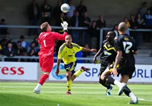 Torquay V Bristol City Prints: Bristol Citys Bobby Reid attempts to life the ball over the keeper but his effort isn t quite