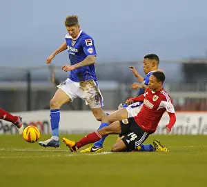 Oldham V Bristol City Prints: Bristol City's Bobby Reid Tackles Korey Smith in Oldham Athletic Showdown