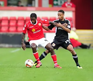 Crewe V Bristol City Prints: Bristol City's Bobby Reid vs Crewe Alexandria's Anthony Grant: A Battle for Ball Possession