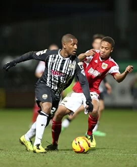 Images Dated 21st December 2013: Bristol City's Bobby Reid vs. Notts County's Andre Boucaud: A Football Showdown at Meadow Lane