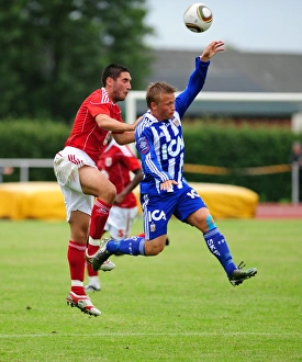 Bristol Citys Bradley Orr challenges for the ariel ball
