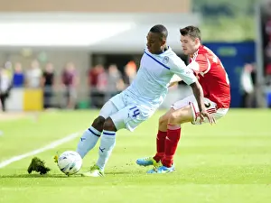 Framed Print : Bristol City's Brendan Moloney Closes In on Coventry's Franck Moussa in Sky Bet League One Clash Framed Print : Bristol City's Brendan Moloney Closes In on Coventry's Franck Moussa in Sky Bet League One Clash