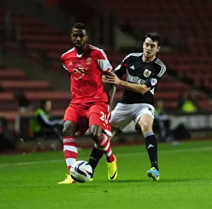 Southampton V Bristol City Prints: Bristol City's Brendan Moloney Closes In on Southampton's Guilherme do Prado in Intense Capital One Cup Clash