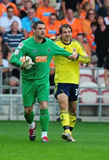 Blackpool V Bristol City Prints: Bristol City's Brett Pitman Slips Against Blackpool's Matthew Gilks - League Cup Match