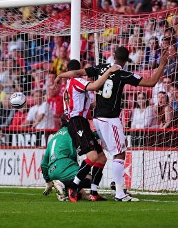 Images Dated 23rd April 2011: Bristol City's Brett Pitman: Unintended Goal Leads to Own Goal by Sheffield United's Steve Simonsen