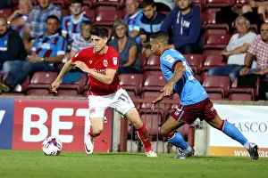 Glanford Park Prints: Bristol City's Callum O'Dowda Breezes Past Scunthorpe's Jordan Clarke in EFL Cup Clash